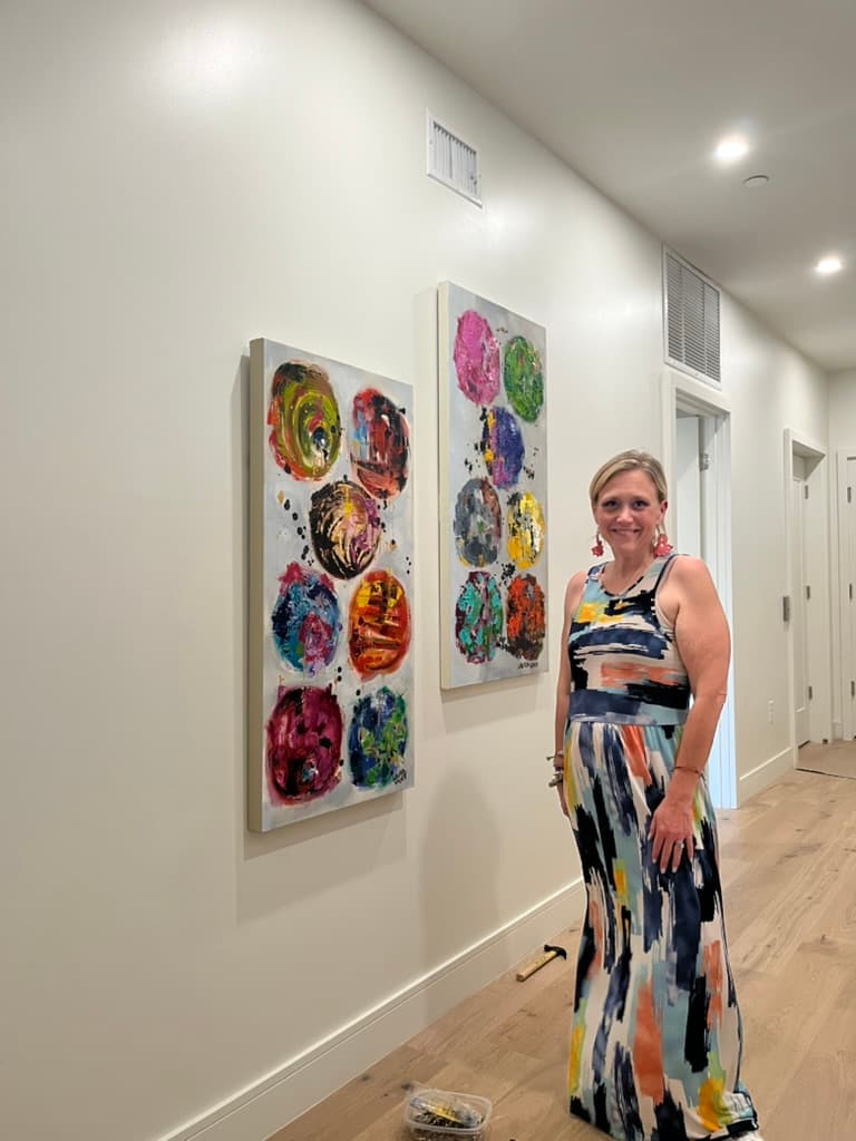Artist presenting completed work