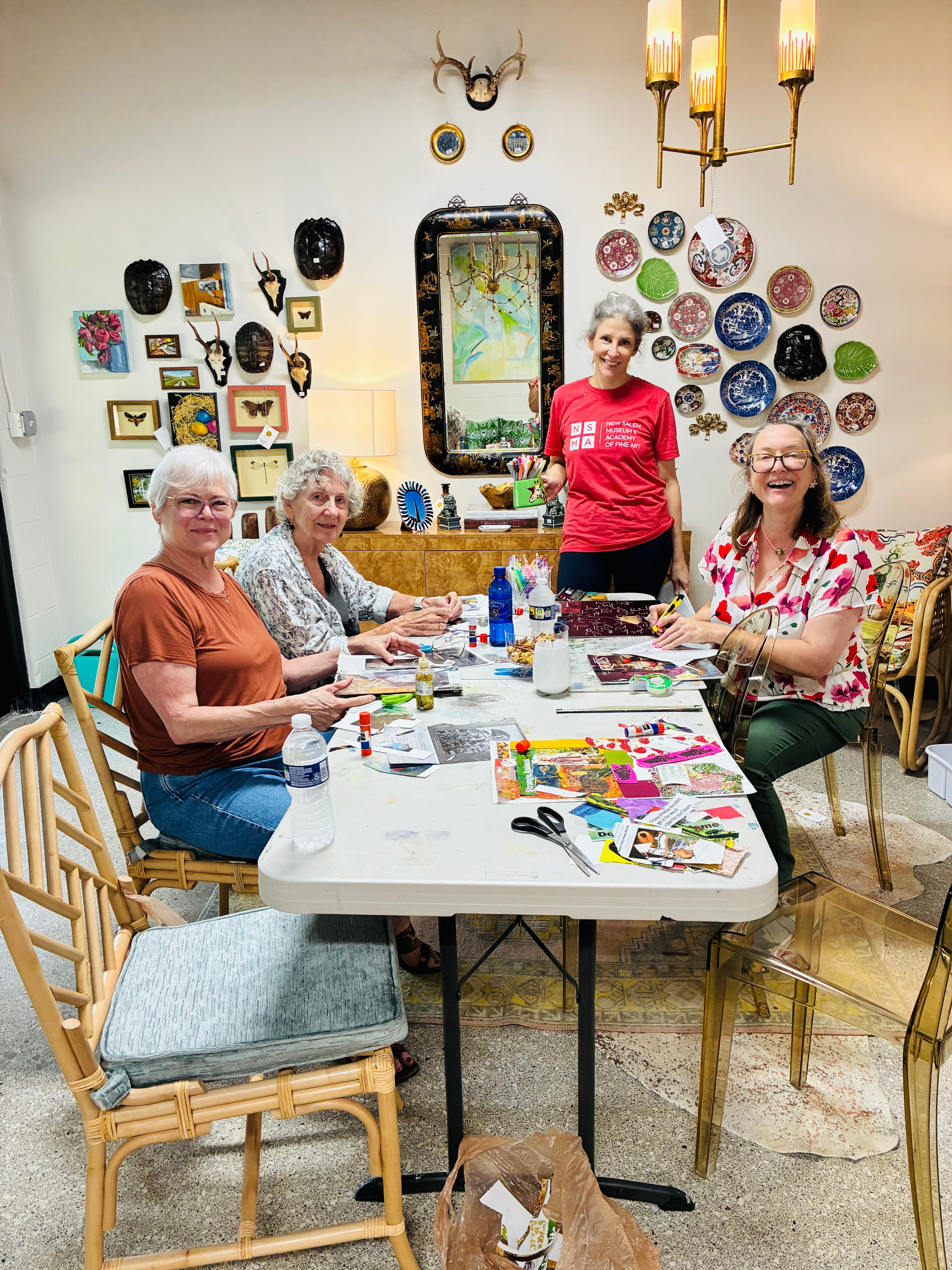 Guests and their instructor at a Pretty Things collage workshop