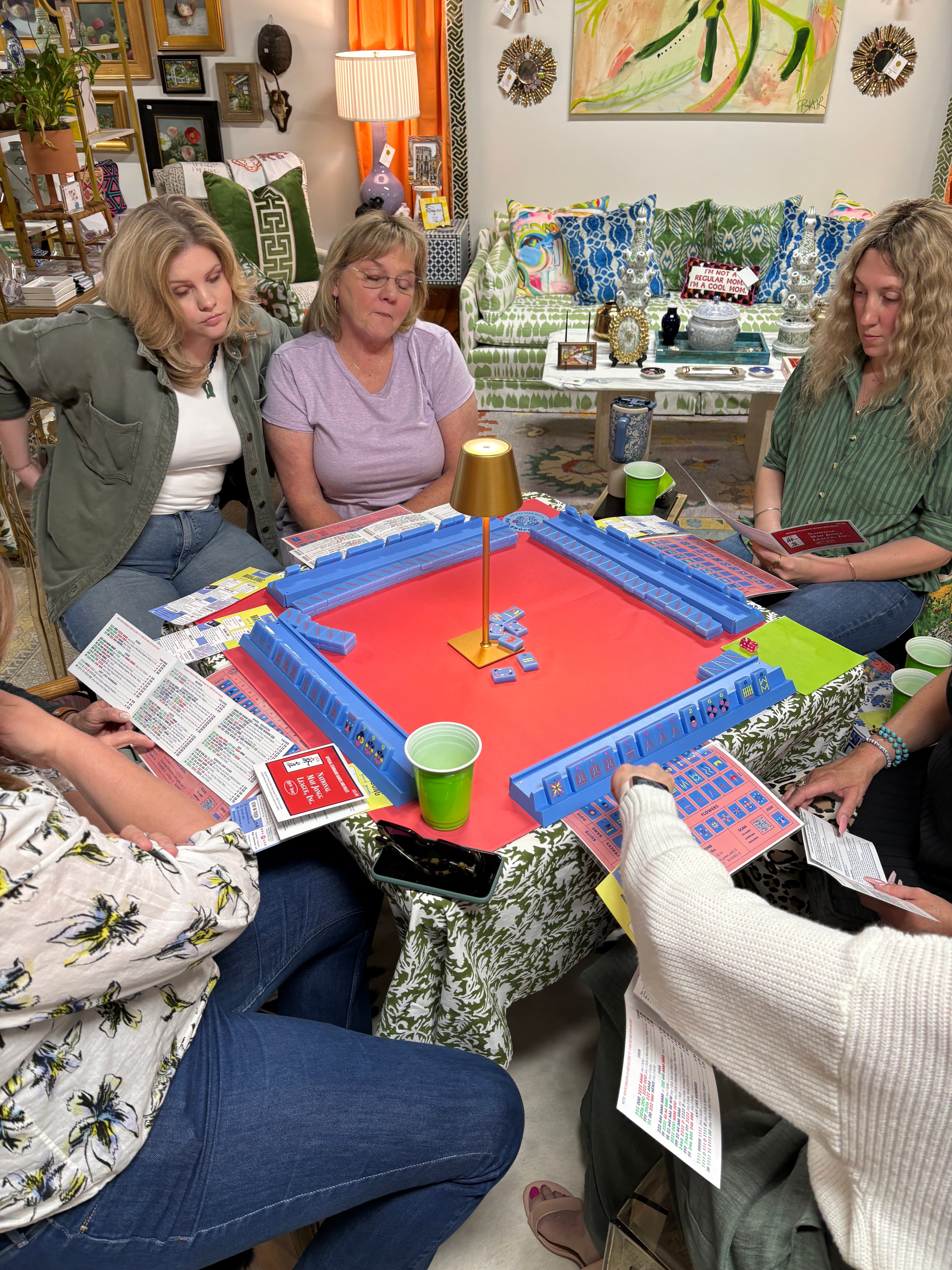 Guests learning Mahjong together