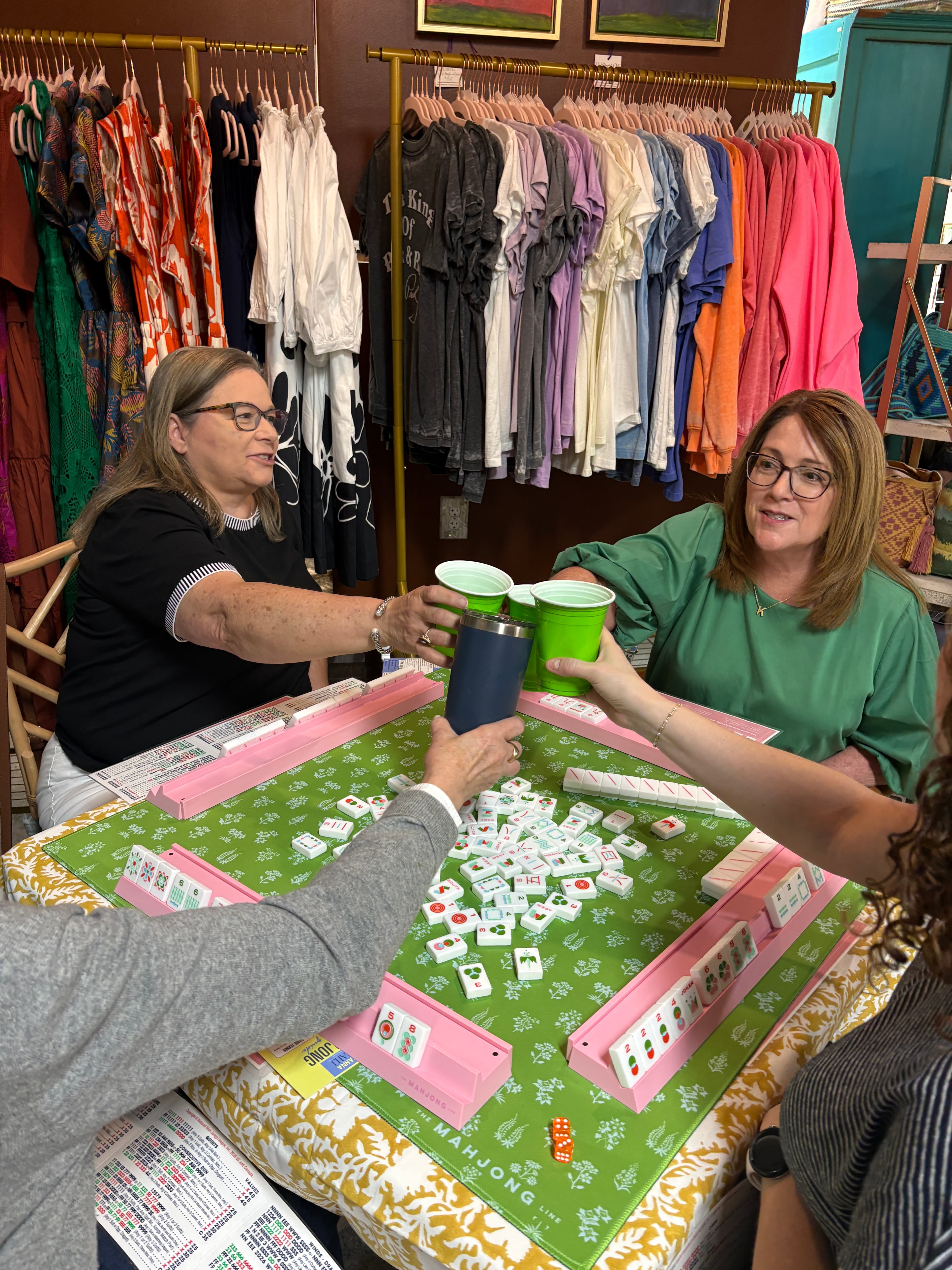 Mahjong guests sharing a toast